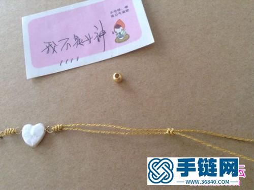 中國結編織心形珍珠手繩教程