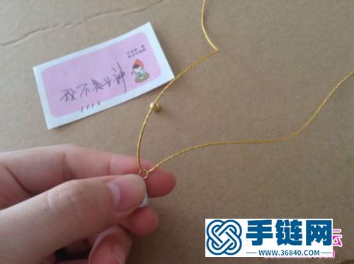 中國結編織心形珍珠手繩教程