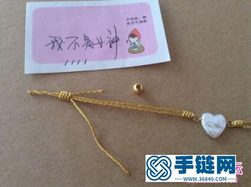中國結編織心形珍珠手繩教程