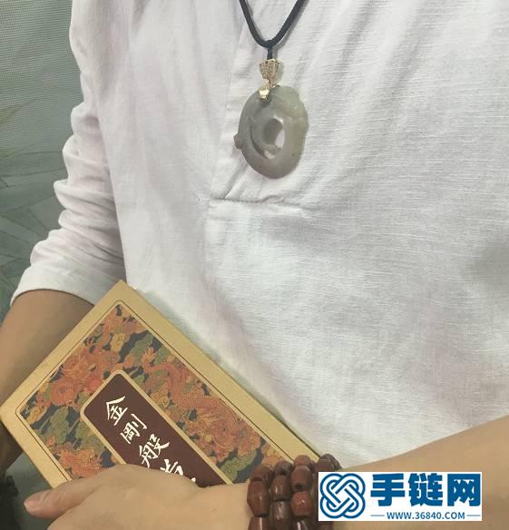 古玉鑲嵌：讓人陶醉的咬尾龍吊墜