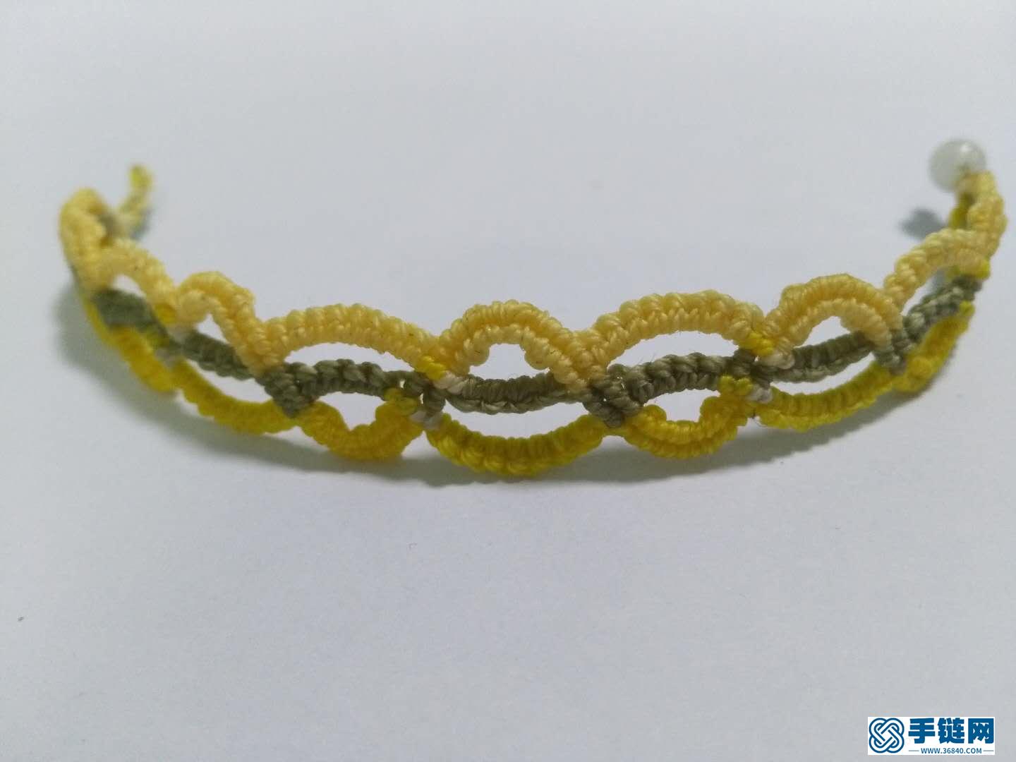 斜卷結(jié)手鏈編法教程，縷空蠟線手繩做法步驟
